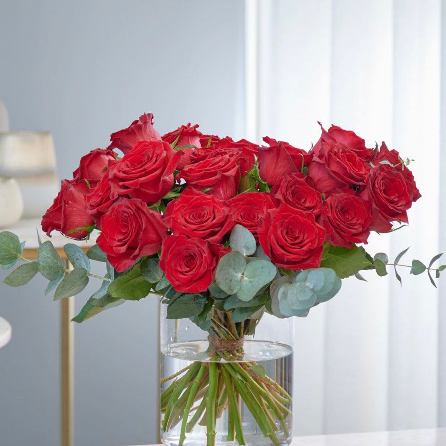 Dozen Red roses in ocean