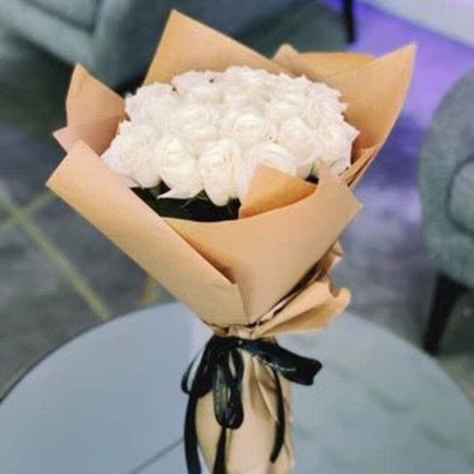 24 white roses wrapped